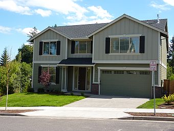 photo of garage side of completed Avocet home plan